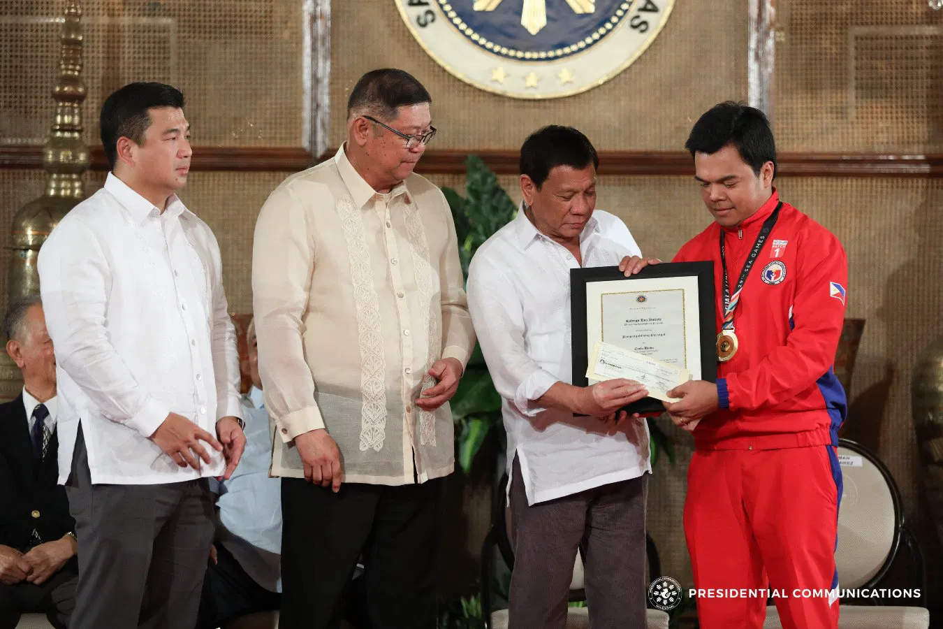 Carlo Biado receives a Presidential Citation at Malacanang Palace