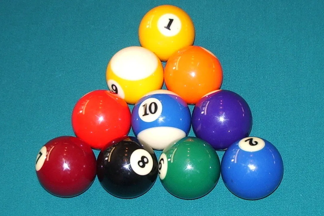 A ten-ball rack: the 1-ball at the apex and the striped 10-ball in the center of the triangle